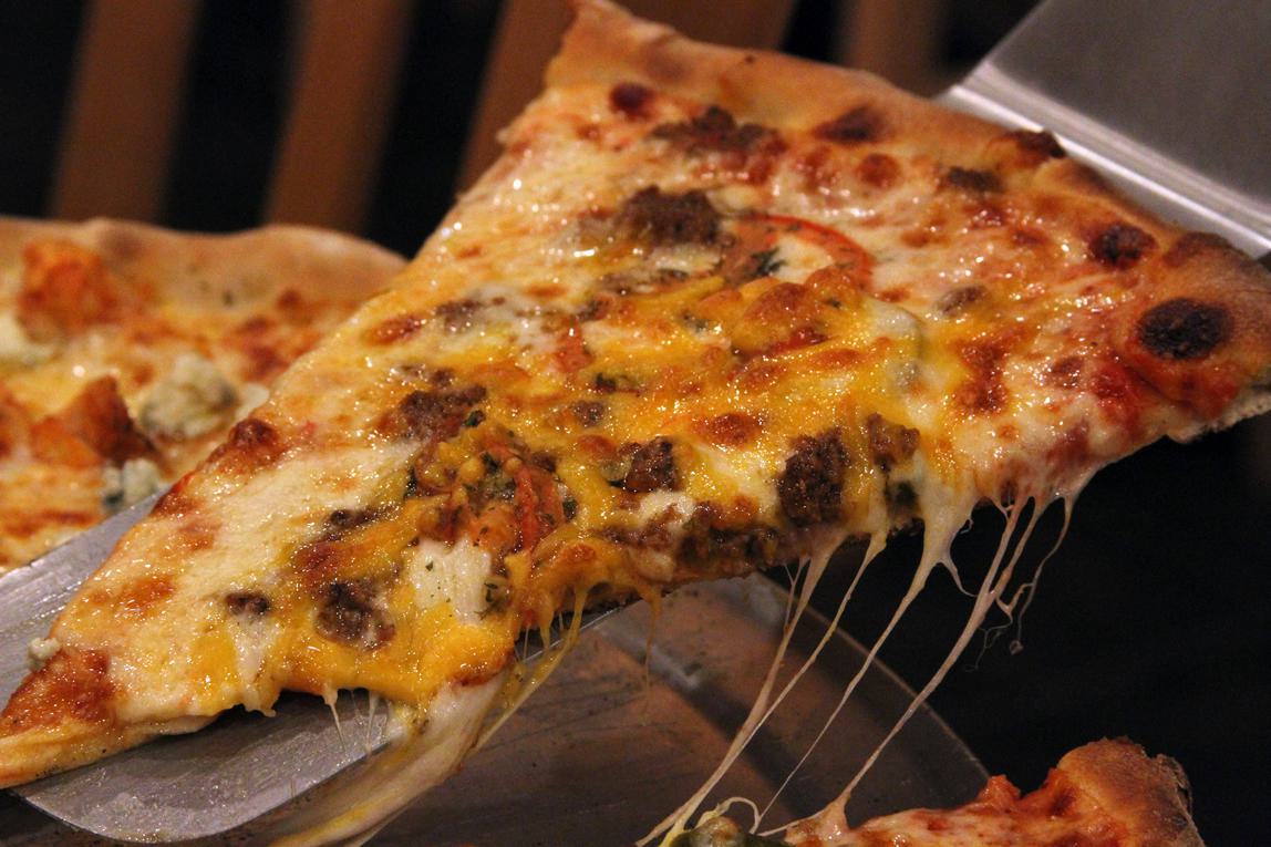 An image of a slice of pizza